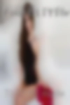 Nude woman play housewife